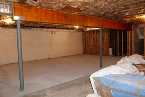 BEFORE: When finishing any size basement, be sure to think about how you will store the stuff you will still need to store.