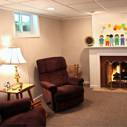 A basement living room finished with our waterproof basement system.
