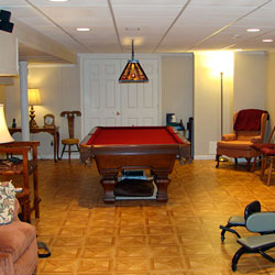 A finished basement billiards room.